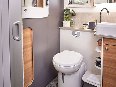 adamo-69-4-rear-washroom-with-sliding-door-access-to-garage-storage.jpg
