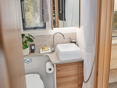  adamo-75-4dl-mid-washroom-featuring-vanity-cupboard-with-mirrored-door-and-toothbrush-holder.jpg
