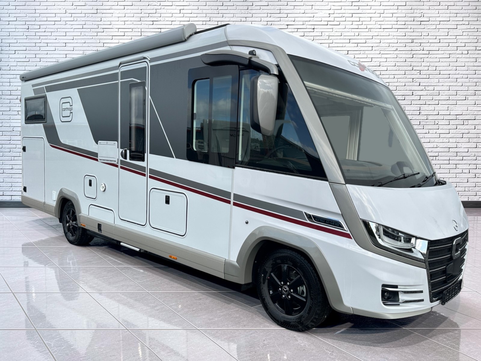 Carthago Chic C-Line I 4.9 LE exterior with awning